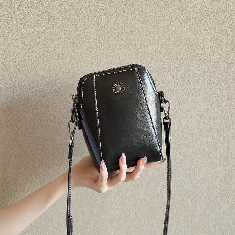 Nesha | Vertikale Crossbody-Handytasche für unterwegs