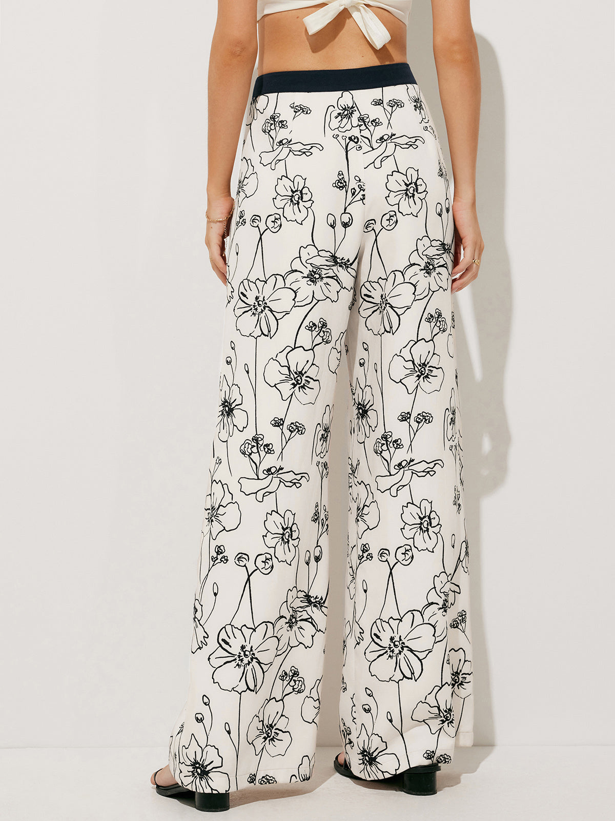 Clara | Weitbein-Pants mit Blumendruck und Taschen