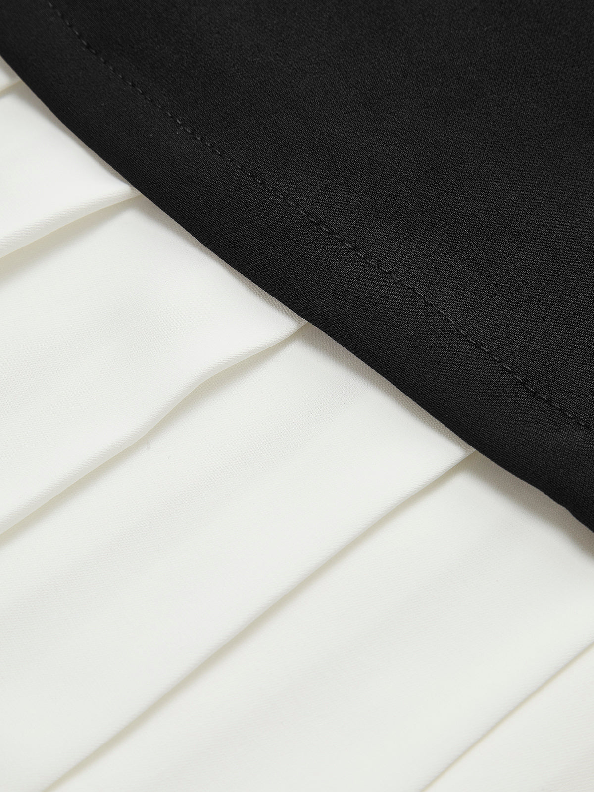 Clara | Zweifarbiges, ärmelloses Faltenkleid