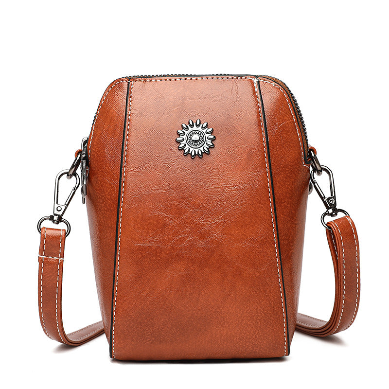 Nesha | Vertikale Crossbody-Handytasche für unterwegs