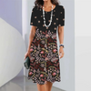 Santos | Damen elegantes Blumenprint-Kleid mit Rundhalsausschnitt